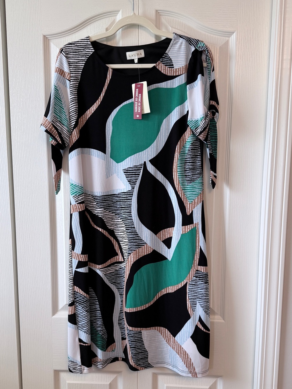 Laura Canada dress size Medium